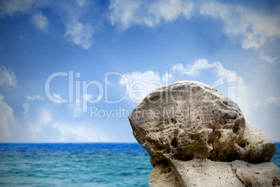 Large rock overlooking sea and sky