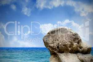 Large rock overlooking sea and sky