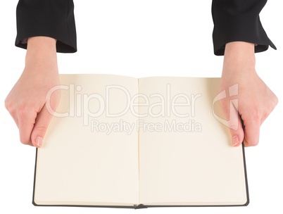 Hands holding an open book