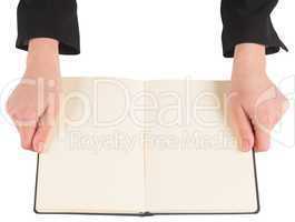 Hands holding an open book