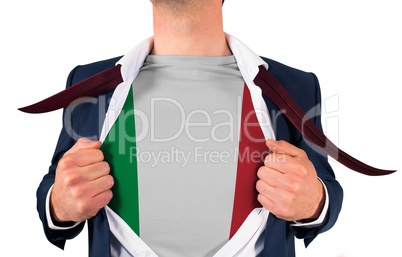 Businessman opening shirt to reveal italy flag