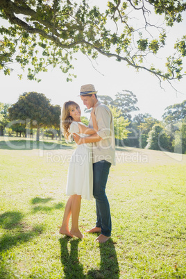 Cute couple posing in the park