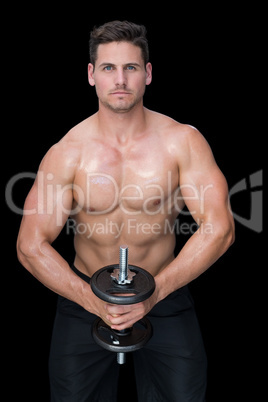 Strong crossfitter lifting up heavy black dumbbell