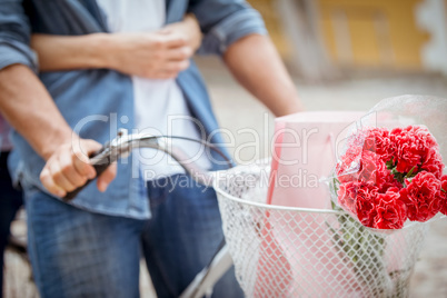 Hip young couple going for a bike ride