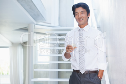 Handsome man drinking champagne