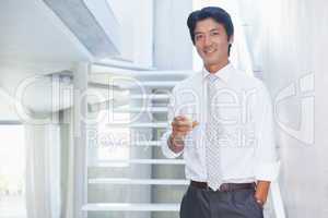 Handsome man drinking champagne