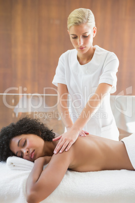 Gorgeous woman enjoying a shoulder massage