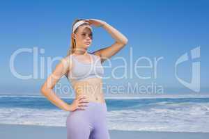 Sporty focused blonde on the beach