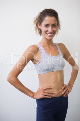 Fit woman smiling at camera