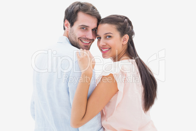 Attractive young couple smiling at camera