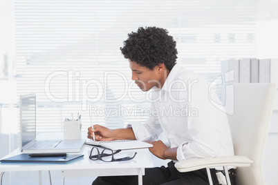 Focused businessman working at his desk