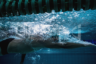 Fit swimmer training on his own