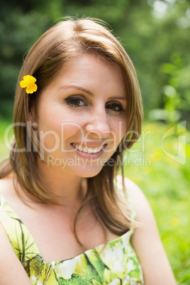 Close up portrait of a cute woman in field