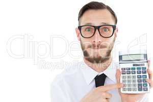 Geeky businessman pointing to calculator