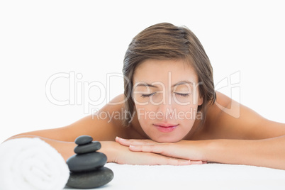 Close up of a beautiful young woman on massage table