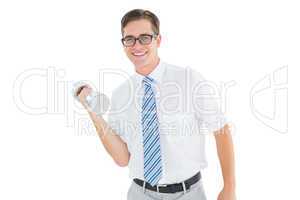 Geeky happy businessman lifting dumbbell