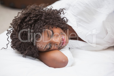 Attractive woman sleeping in bed