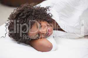 Attractive woman sleeping in bed