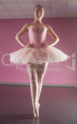 Graceful ballerina standing en pointe