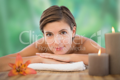 Beautiful woman on massage table at health farm