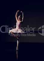 Beautiful ballerina dancing en pointe