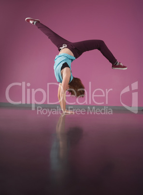 Pretty break dancer doing handstand