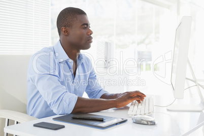 Focused businessman working at his desk