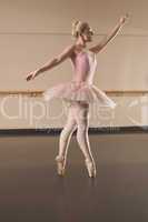 Beautiful ballerina dancing en pointe