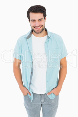 Happy casual man smiling at camera