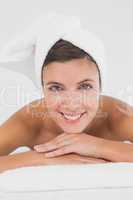 Close up portrait of a beautiful woman on massage table