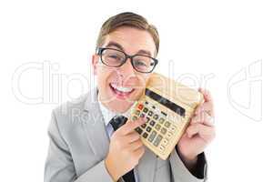 Geeky smiling businessman showing calculator