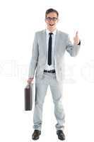 Handsome businessman showing thumbs up