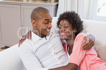 Cute couple relaxing on couch