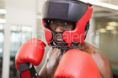 Male boxer in defensive stance