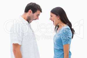 Angry couple shouting at each other