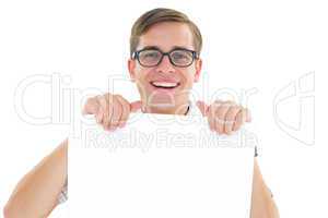 Geeky hipster smiling and showing card