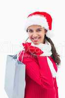 Beautiful festive woman holding shopping bag