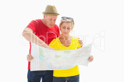 Lost tourist couple using map