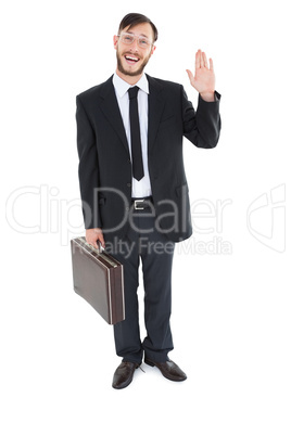 Geeky businessman waving at camera