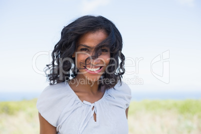 Casual pretty woman smiling at camera