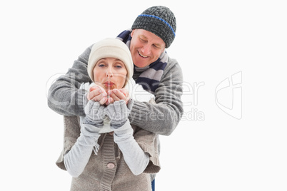 Happy mature couple in winter clothes