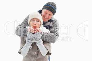 Happy mature couple in winter clothes