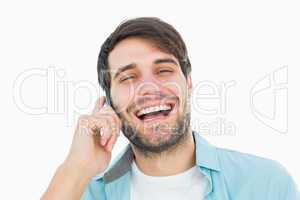 Happy casual man talking on phone