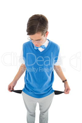 Geeky young hipster showing empty pockets