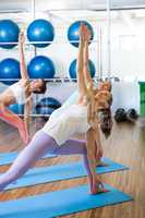 Yoga class in fitness studio