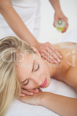 Beautiful blonde enjoying a back massage