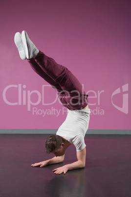 Cool break dancer doing handstand