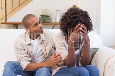 Crying woman not listening to his excuses