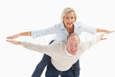 Happy mature couple having fun