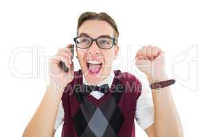 Excited geeky hipster talking on the phone